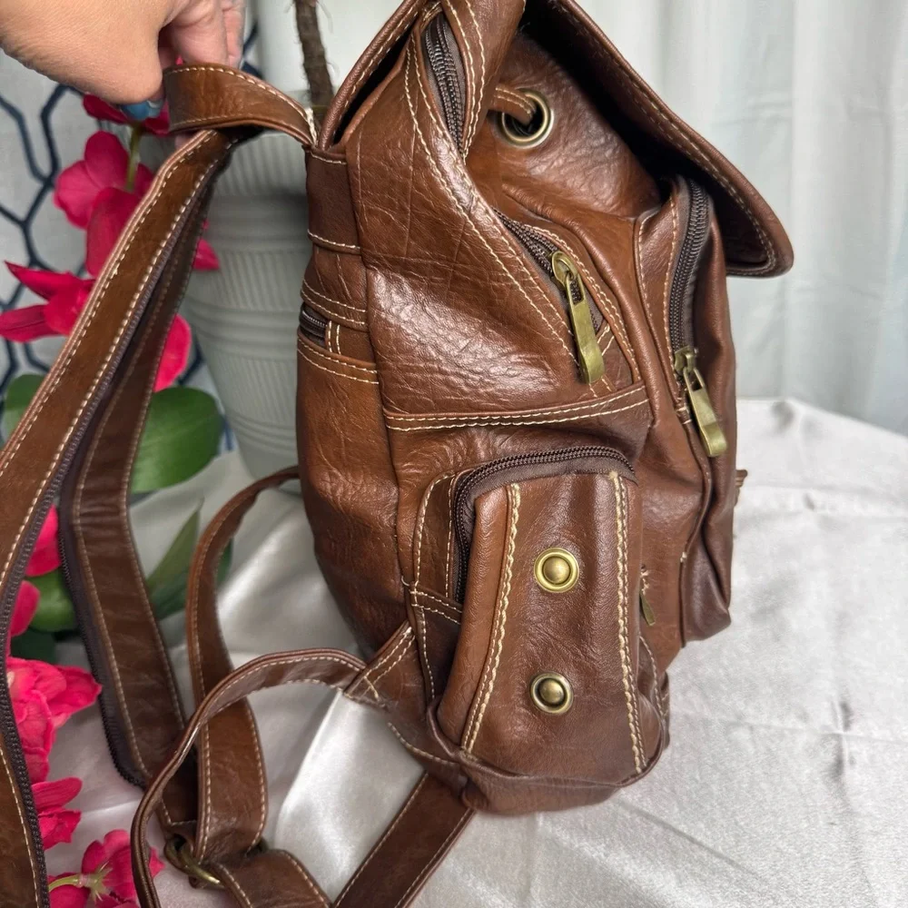 Brown Leather Backpack with Gold Accents